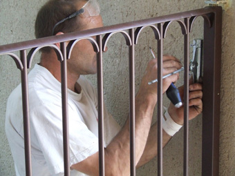 pose portail fer forg&eacute;